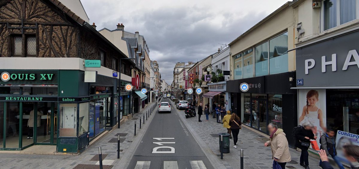 Petite observation urbaine : voici la rue des Bourguignons, rue très vivante et grandement commerçante dont un trottoir est sur Bois-Colombes, l'autre sur Asnières-sur-Seine.