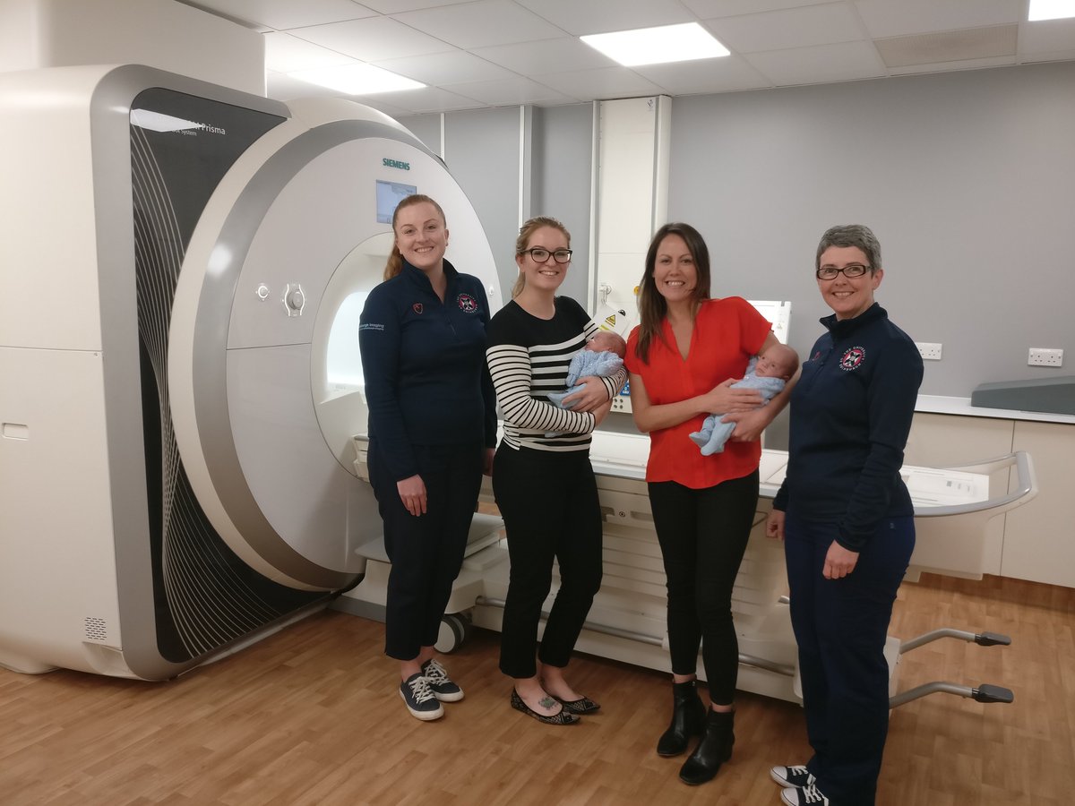 We collect a whole bunch of information from babies and their families around the time they're born, including brain scans. This photo shows some of our team, including the 100th and 101st recruits before their scan!