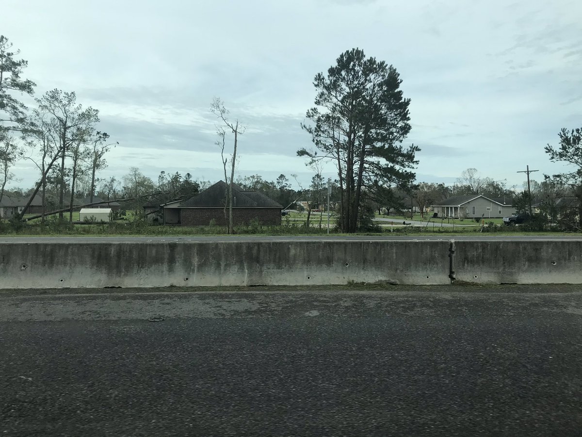 Driving into Lake Charles now. Massive wind damage all around the area driving into town: Mobiles homes shredded, roofs ripped off, trailers thrown around.