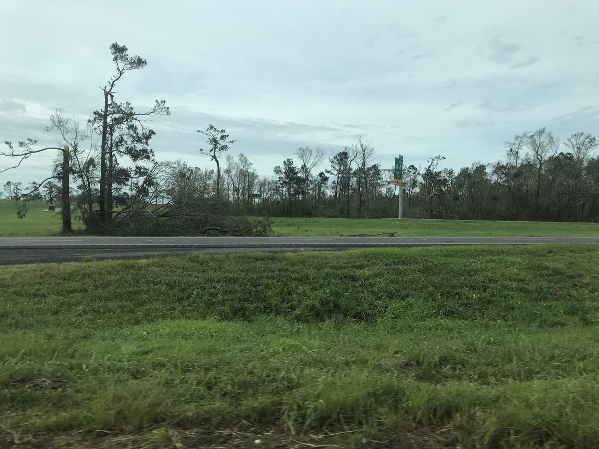 Driving into Lake Charles now. Massive wind damage all around the area driving into town: Mobiles homes shredded, roofs ripped off, trailers thrown around.