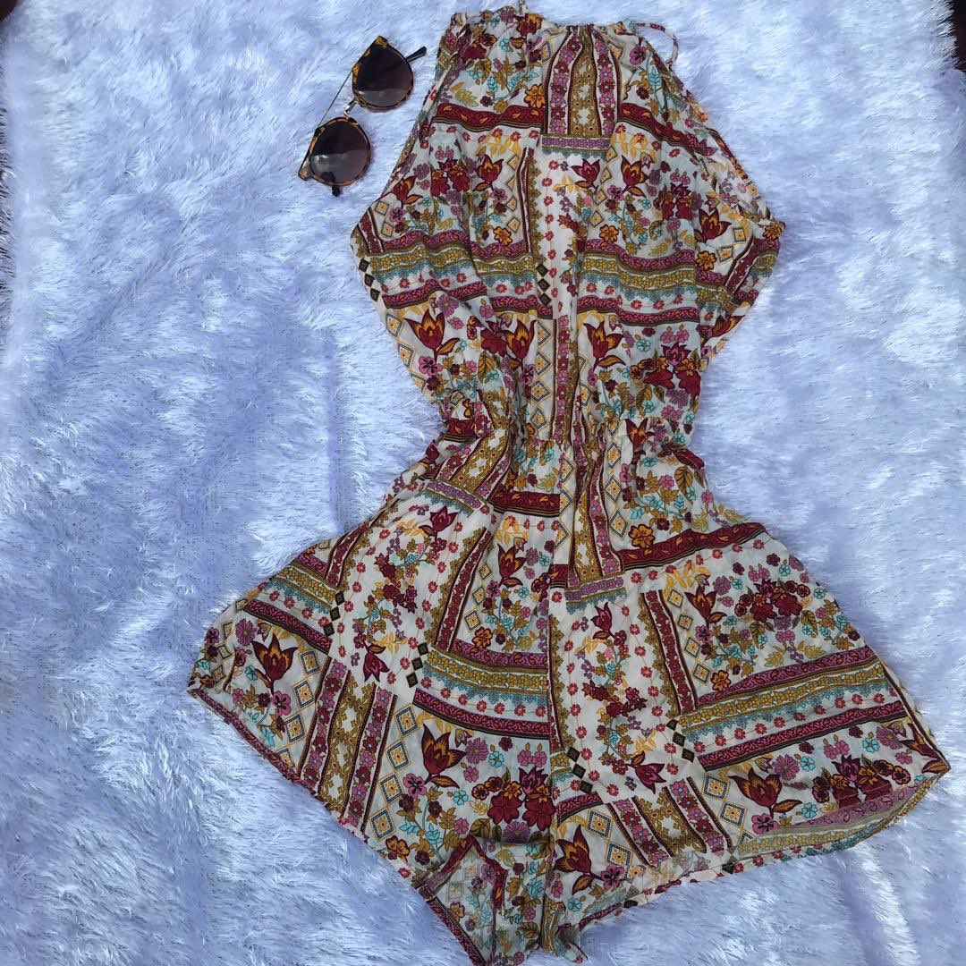Open back Playsuit Size: US 8Price: N1,000