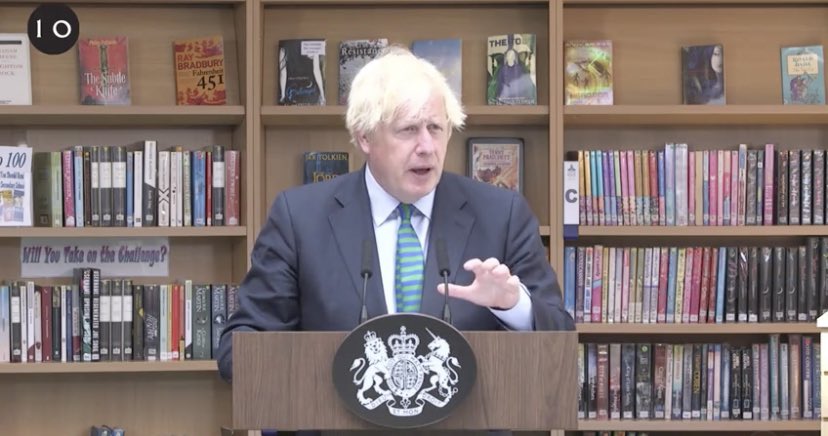 Now directly behind Boris’s Head in full view we have:BetrayedThe ResistanceThe TollThe resistance already covered and is apt. The Toll description is added. To either side of him is Lord Of The Rings & Terry Pratchett Guards Guards book both have alternate worlds. 14/20