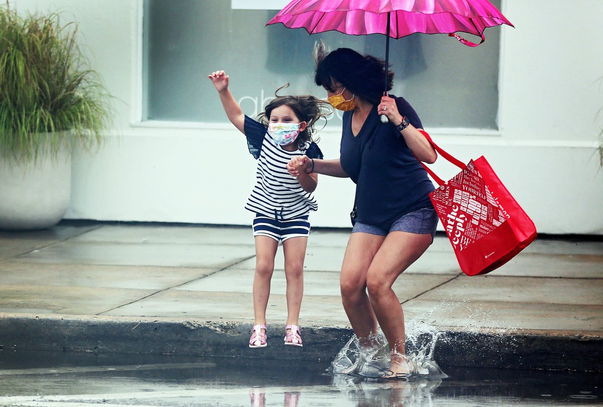 mikesimonsphoto's tweet photo. And the cool parent award goes to... parents who jump in puddles with their kids. You can tell she's smiling with a mask on. #okwx #rain #howtomom #parent #tulsa #photojournalism https://t.co/990ueGd8EC https://t.co/G5R1ATSRcj