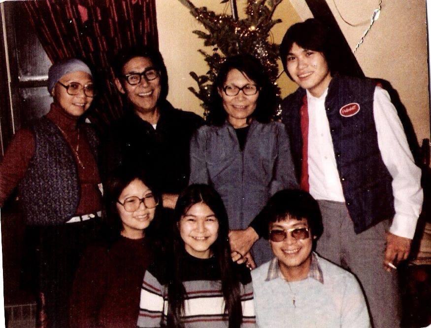 Here he is as a young man, with me when he was older, and one from before I was born with some of my aunts and uncles (my mom on the bottom left). 