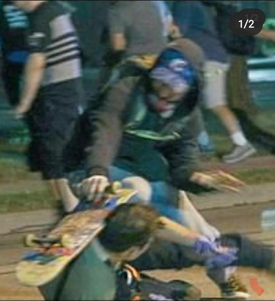 ProfessorChar12's tweet photo. @IlhanMN Kyle being attacked before defending himself https://t.co/CtOKT8DIJk
