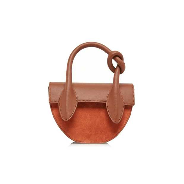 We strictly adhere to the highest standards, ensuring our leather shoulder bag is of the best quality. #leathershoulderbag #purpleleatherhandbags #brownleatherbag
