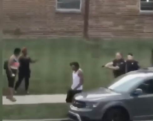 Remember these scenes when the Republicans and police do the "he was a thug! Officers feared for their lives!"Look how ready they are to shoot a man wearing nothing but a t-shirt and shorts. No knife. Walking to his car. The cops had to have seen the kids.....