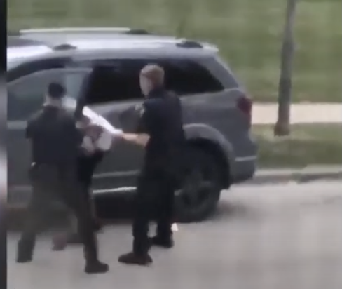 ...once again - if they are going to say he had a knife, this cop is beyond incompetent. This is a "dont go away" move not a "I must stop you" move. He could grab his shoulder, he could step back. Instead, he is pulling him on his t-shirt to bring him back...