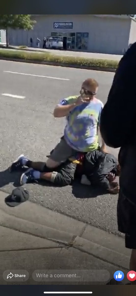 D pulled in, went on fb live to document, & started yelling at the guy to get off of him. Allegedly the guy threw a rock towards the street, so this white dude took it upon himself to stop and knock the brown guy down and pin him in the road. Photos are screen caps of vid >>>
