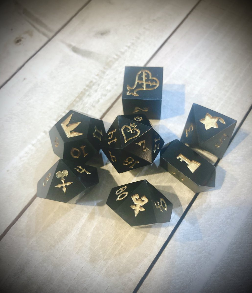hardlightforge's tweet image. New “Hearts of Darkness” dice. I really love these. They are Simple and Clean, as it were. Available on my Etsy.  #dice #dnd #handmadedice #diceporn #KingdomHearts #MelodyofMemory #ttrpg #keyblade #5e #customdice