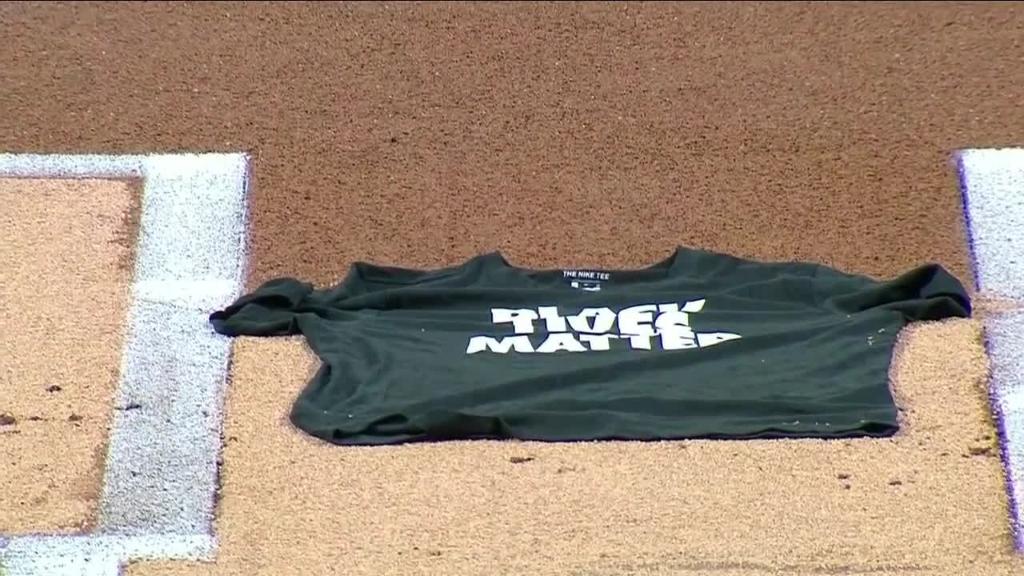 The Mets and Marlins held a moment of silence, then left the field. The only thing that remained was a Black Lives Matter shirt at home plate.