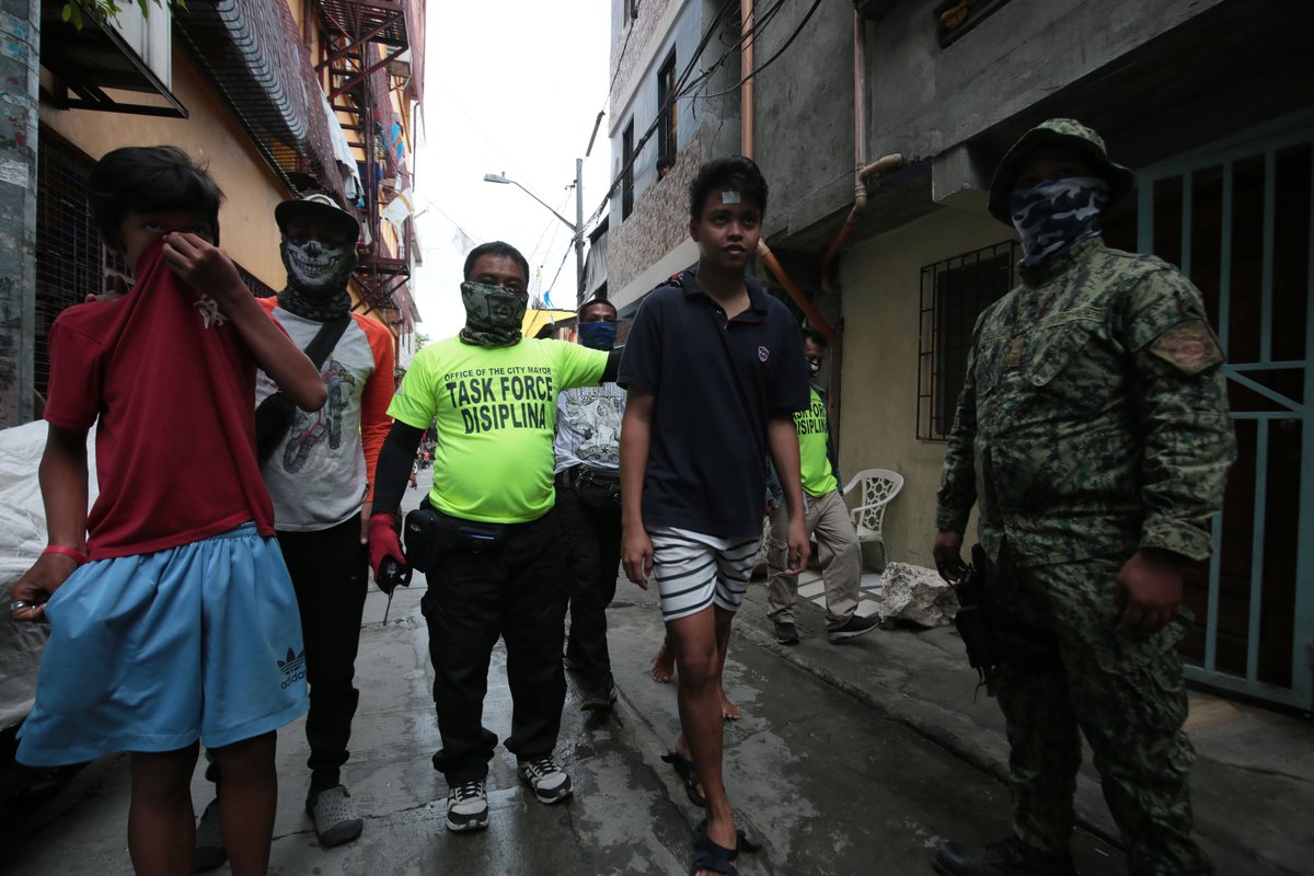 LOOK: Back in July, the police accosted health protocol violators in Quezon City.The violators were brought to a Task Force Disiplina office using a vehicle where they were unable to observe social distancing. They were fined P1,000 for first offense. STAR/Michael Varcas