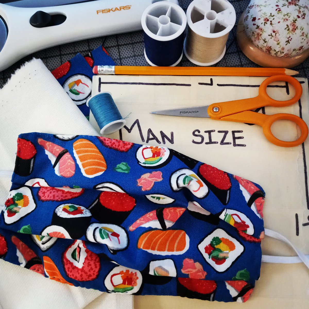KiwiPie16's tweet photo. Made Dale a new mask ❤🍙🍣 #sushi #fabric #mask #handmade #handsewn #ppe #lowerthecurve https://t.co/0JZ5g3NNJs