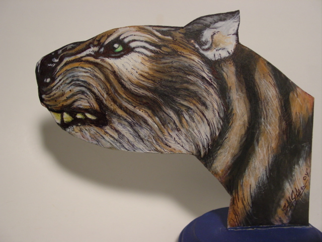 And some artists have deliberately depicted Thylacoleo with a pattern and colour scheme matching what’s shown in Martin’s photo. The model here is (I think) by Jeff Johnson, the painting by Markus Bühler…