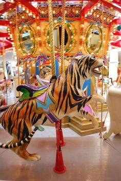 But there have been repeated claims that the object might not be an animal, but a cardboard cut-out, a taxiderm specimen (of what?), or a MERRY-GO-ROUND TIGER like those shown here. This idea was posted as a comment on my blog, but the comment has been lost due to hosting issues.