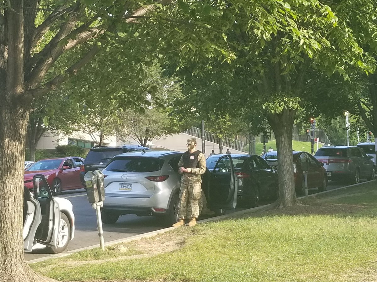 Less of an (overt) police and military precense so far than I expected. Couple of National Guard members chilling by Constitution and 23rd. Crowds grow as you approve the Lincoln Memorial.