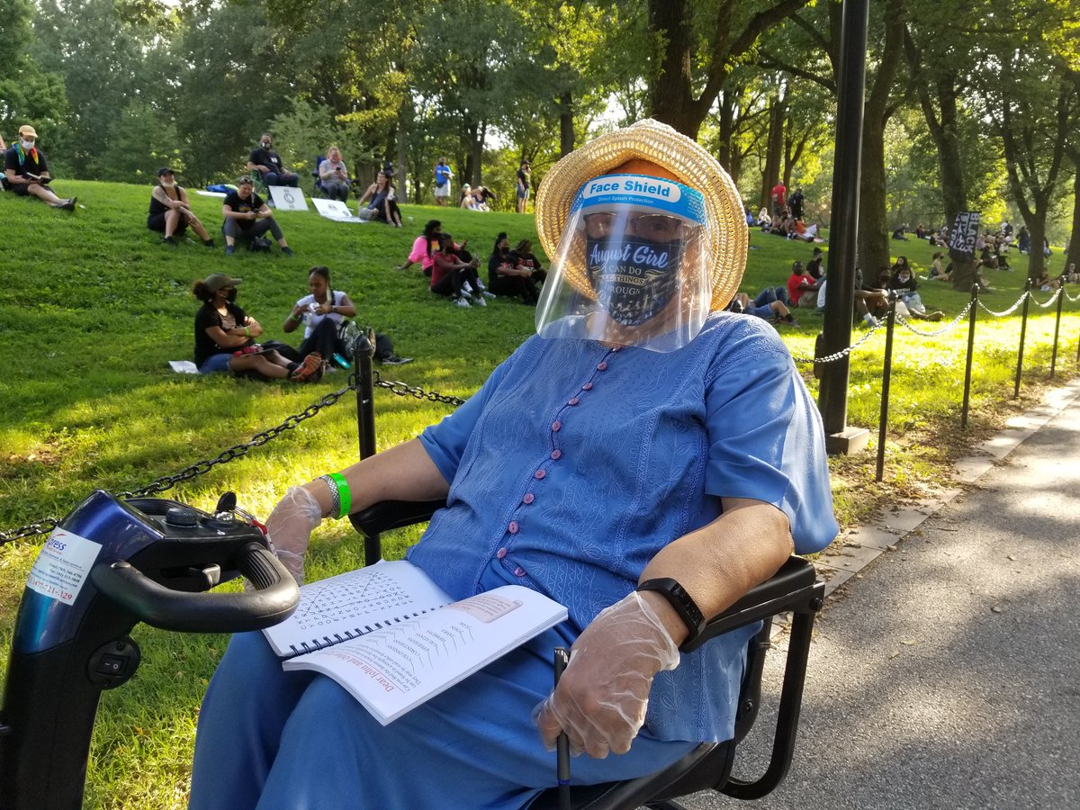 I spotted Syble Bradshaw enjoying the shade and her crosswords and asked her."I wanted to be here for my people," she said. "I've been thinking of all the people police killed."She came here all the way from California with her daughter. She turned 80 last week.