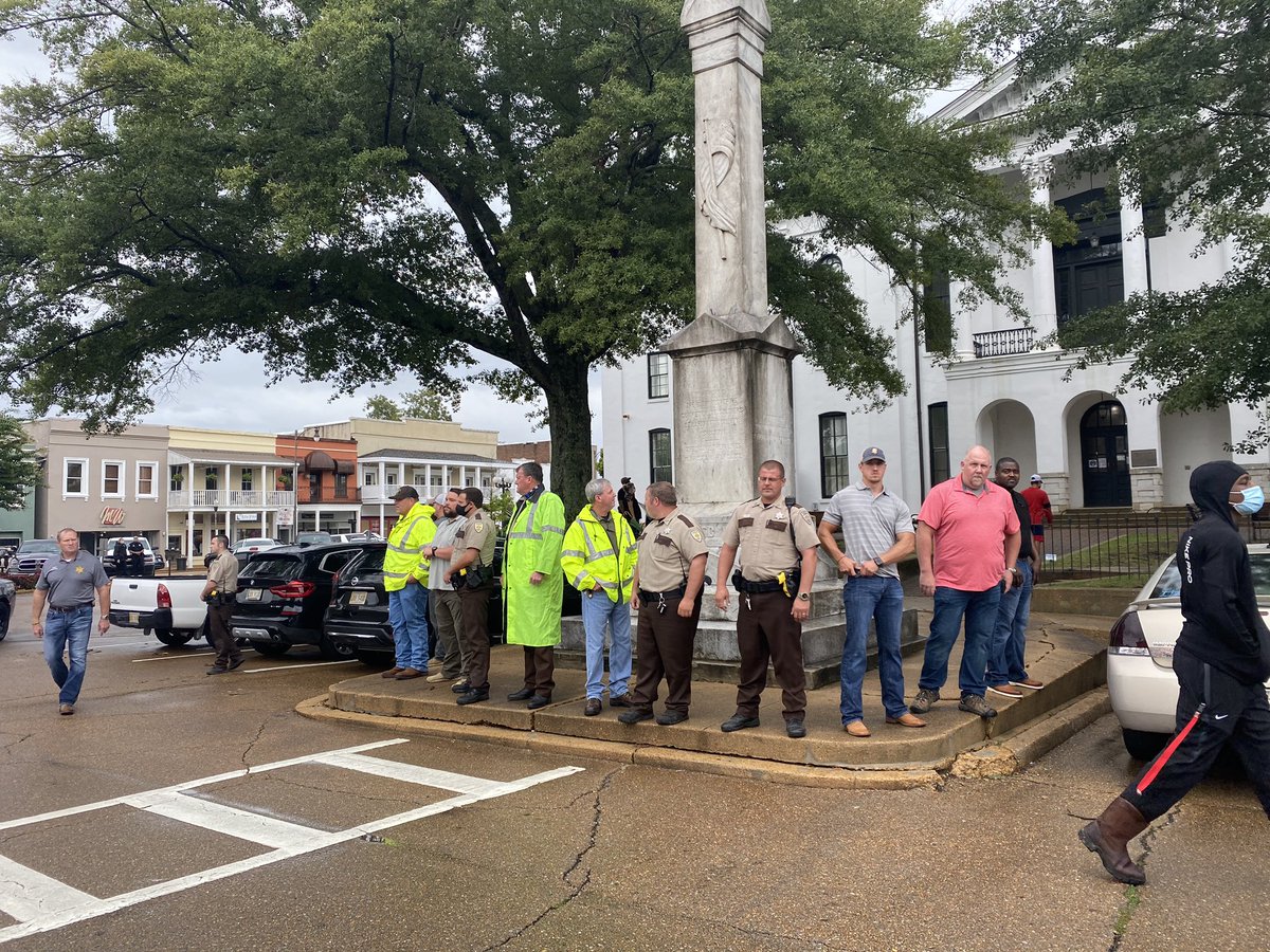 The Ole Miss team was peacefully protesting under the Confederate statue. Once they left to circle the block, police and other men surrounded it.