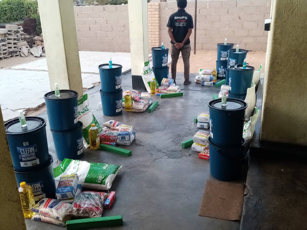 BVTOrg's tweet photo. In response to the Luveve water crisis @bvtatrust in partnership with @CitizensManifesto and Citizens Working Group on Good Governance handed over medication, food hampers, sanitisers and water buckets to 8 families who are victims #KickOutCorona #KhahlelaliCorona #CleanWaterforB https://t.co/q2efyDVOVI