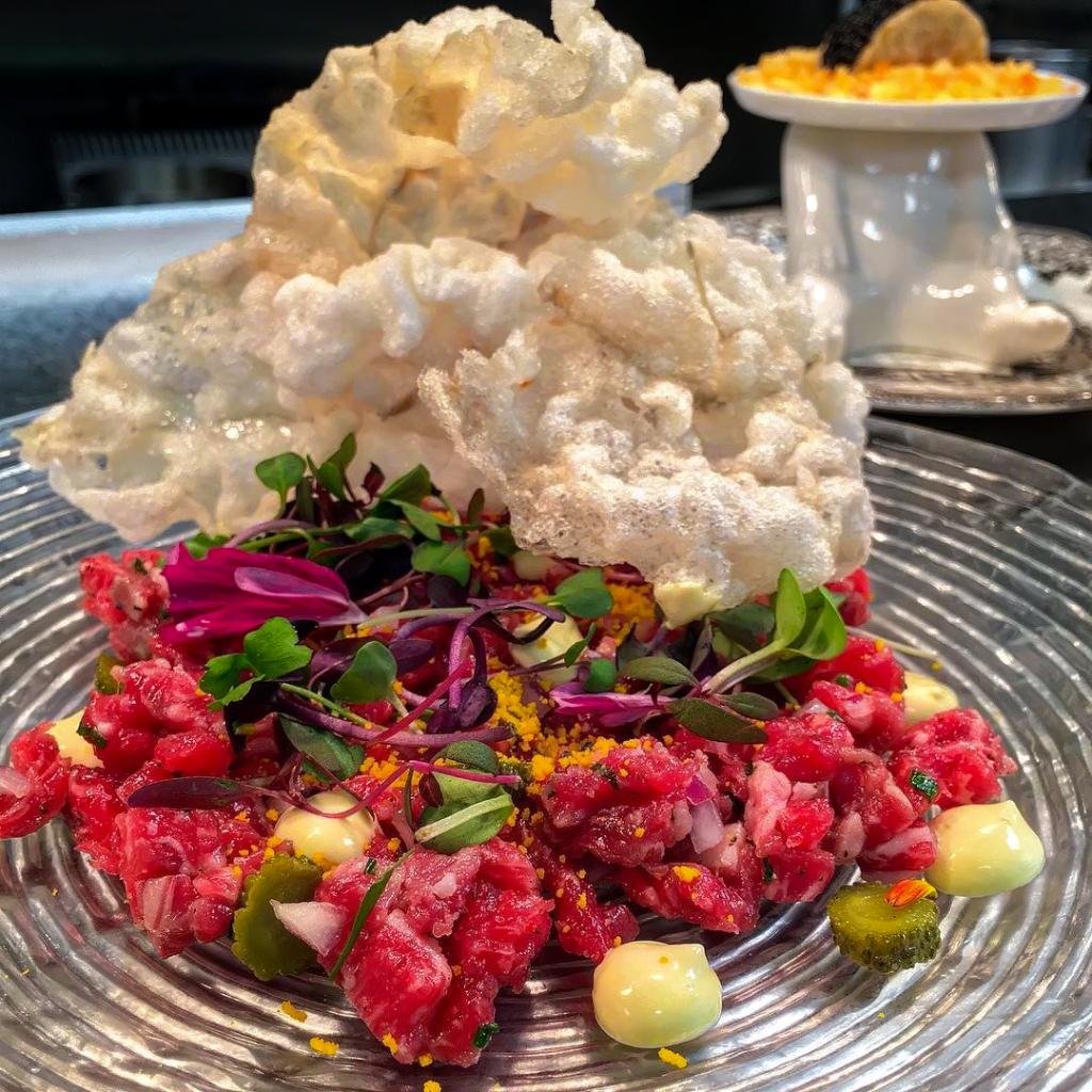 Dig into decadence with the Wagyu steak tartare, made with beef chicharron, cornichon, and savory mayonnaise. 
Photo Cred: <a href="/A_Maiden/">Andy Maiden</a>
