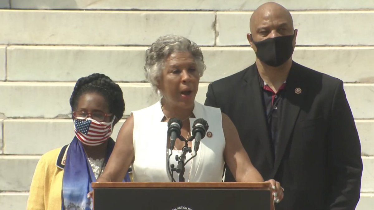 Members of the Congressional Black Caucus speak at the March on Washington. Rep. Joyce Beatty of Ohio is speaking at the podium.