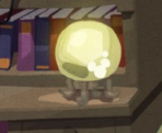 jamil's hidden mickey is on the yellow lamp on his desk