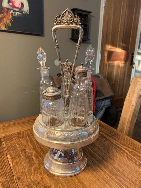 GoatneckG's tweet photo. Excited to share the latest addition to my #etsy shop: Vintage Silver Cruet Condiment Set with Swivel https://t.co/bAFSSjqRFU #silver #birthday #mothersday #clear #glass #cruetset #cruet #oilandvinegar #silvercruet https://t.co/w4CfmfRS8K