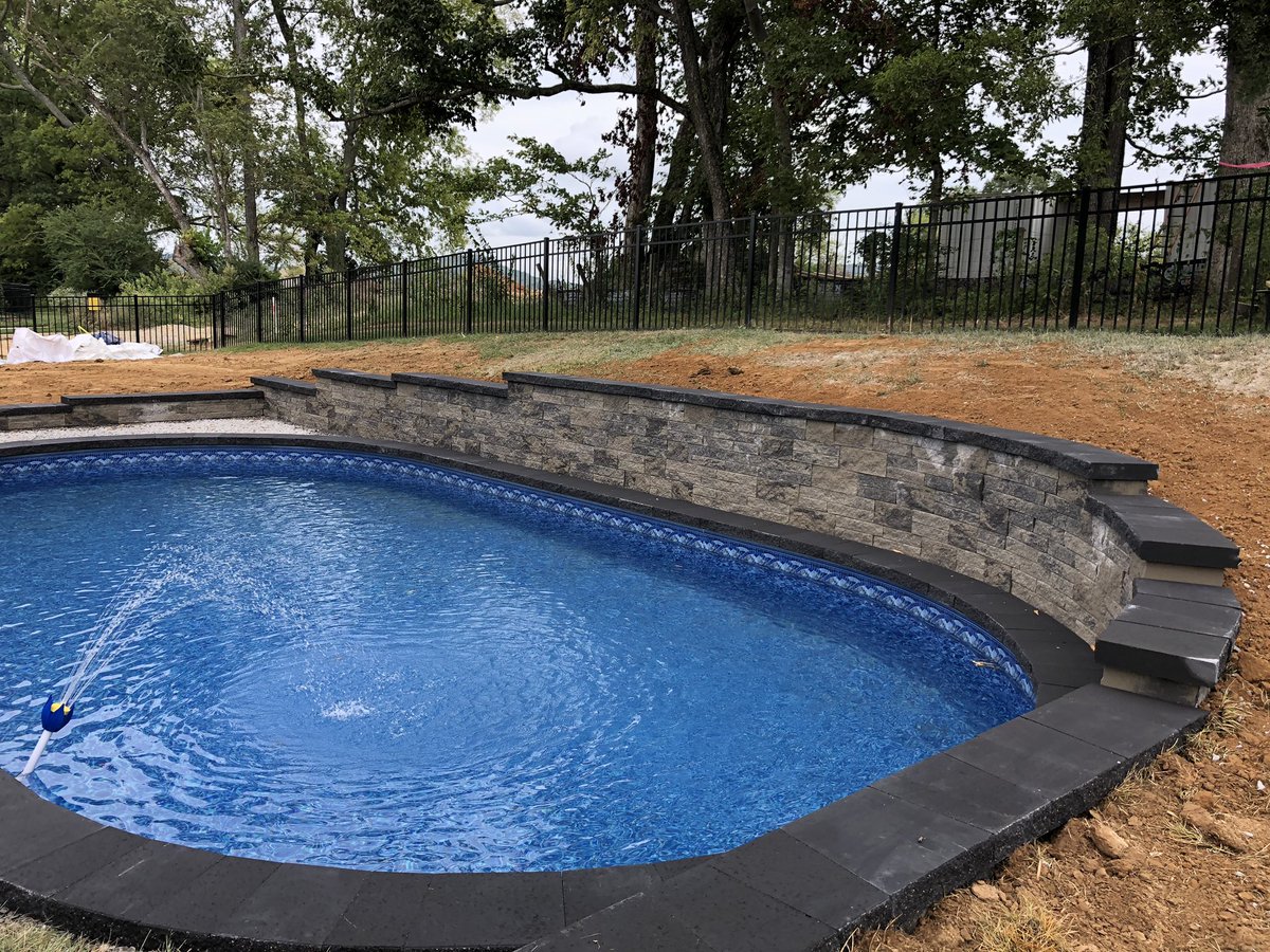Our #TechoPro <a href="/willosaurus/">Will Landers</a>.rex and his crew from #DenaliExteriors laid down a sweet <a href="/techobloc/">Techo-Bloc</a> backyard in the Nashville area. Our #MiniCreta wall with our #OnyxBlack caps, as well as pool coping, really make this pool area pop!! 💦💦💦