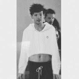 2. ex 1D band member Louis Tomlinson wearing his cropped merch