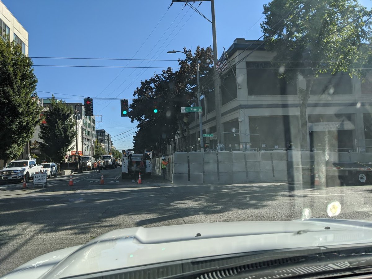 CascadiaDept's tweet photo. Wow. Do you think that the @SPD is scared of something? Streets in front of 13th precinct all shut down as they add triple layer concrete blocks. #BLM #Seatteprotests #CHOPcomms #CHOP #Seattle #Cascadia https://t.co/iz4UXr8muL