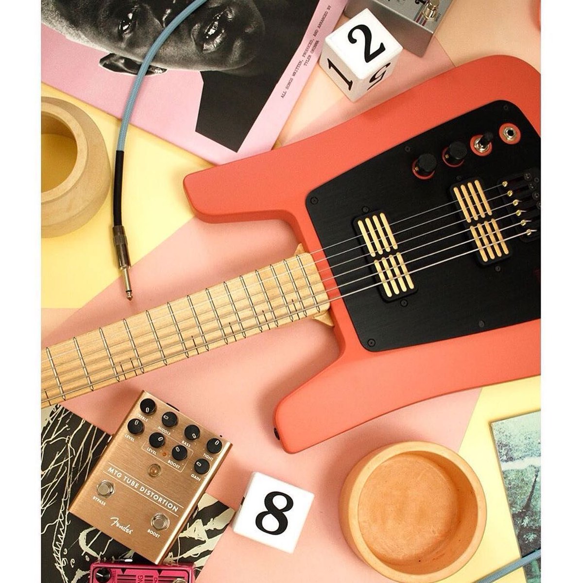 empress_effects's tweet photo. What do you all think of Steve’s new guitar?  The MGB6 SN005 in coral red with maple neck and MMGF pickups. Thanks @millimetricinstruments! 

#coral #mapleneck #millimetricinstruments #goldfoilpickups #baritone #bassvi https://t.co/Db2iXh5Xkb