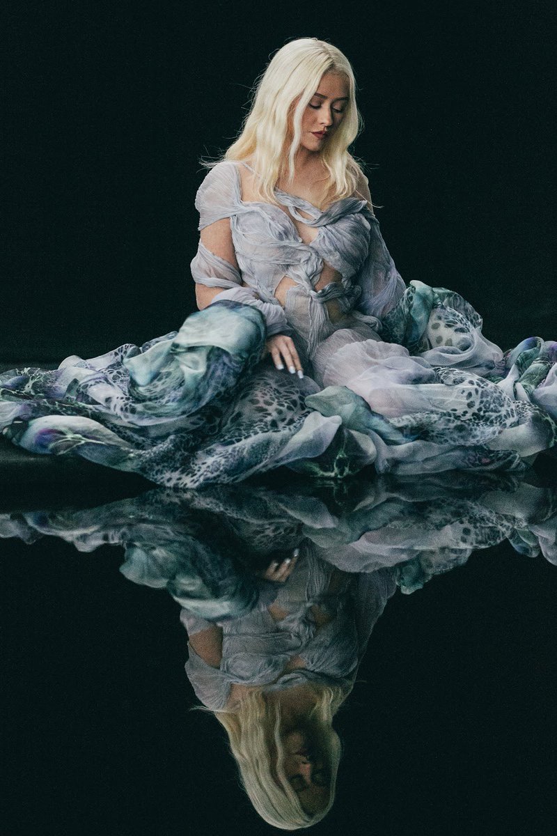 xtina's tweet photo. Who is that girl I see...🤍🖤 https://t.co/3gEvTRVMf8