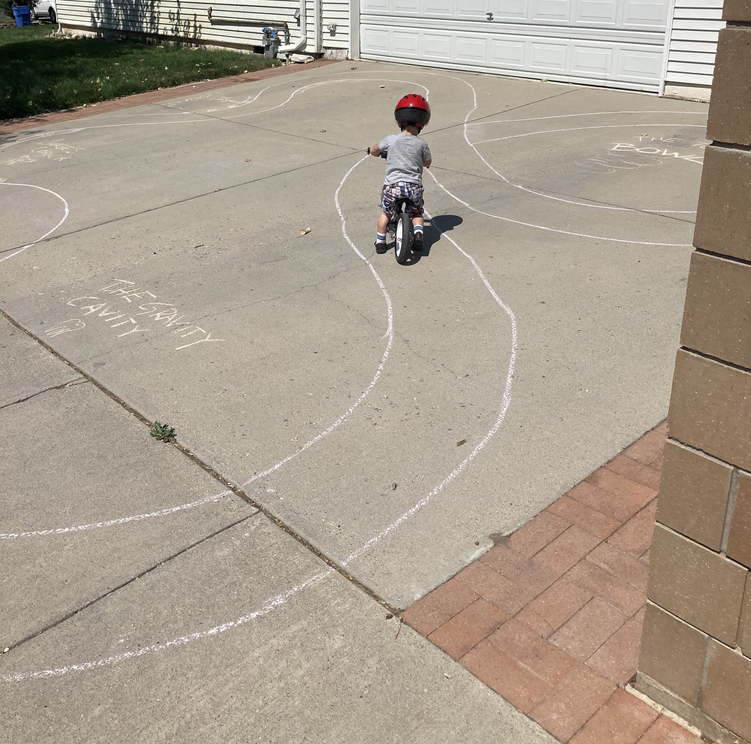 SECOND UPDATE: Neighbor just sent me this photo taken about an hour ago. Guy is still doing the chal