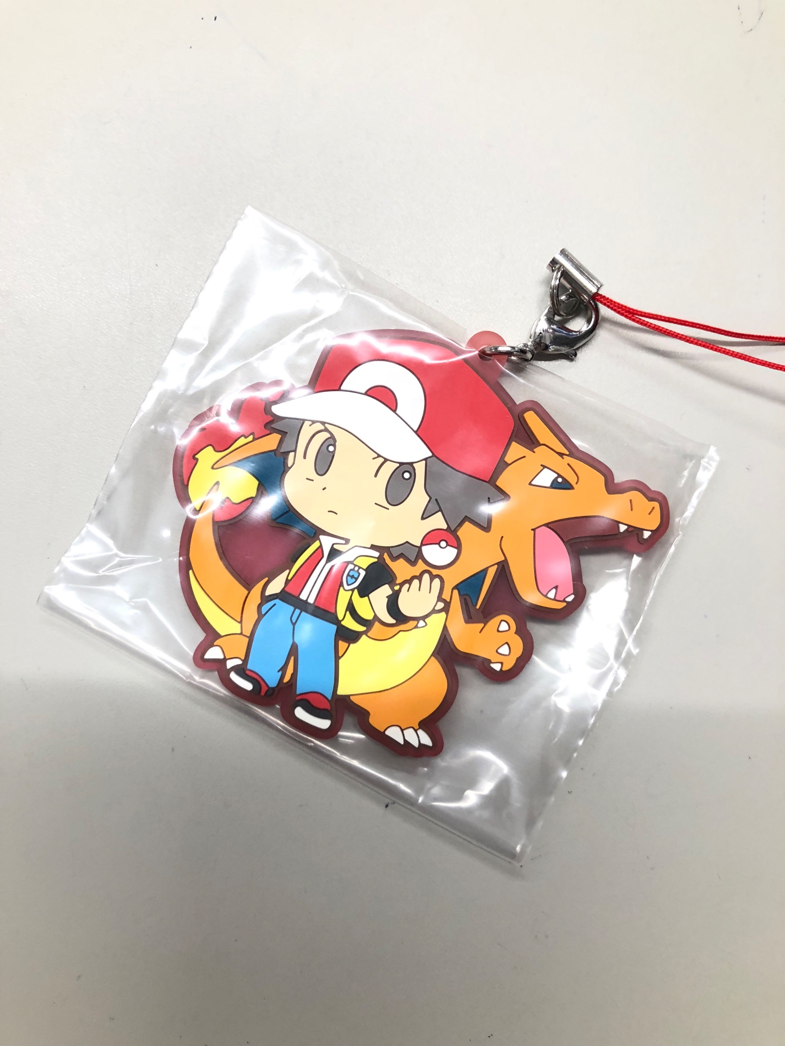 K Books Game館 入荷情報 ポケモン トレーナーラバーストラップ レッド リザードン 入荷です ポケモンマスターズの大型アップデートのcmでもこのコンビはめちゃくちゃかっこよかったです Kbooks Pokemon ポケモン リザードン レッド