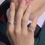 his pinky with a ring )):