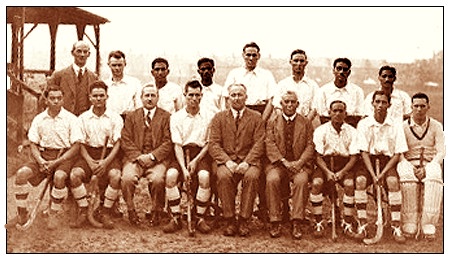 1928 Olympic Gold Medal winning Hockey Team. This was the first Gold Medal for India. India played 5 matches and won all and scored 29 goals out of which 14 goals were scored by Dhyan Chand Singh Bais and was top scorer of the Tournament. Dhyan Chand is standing fourth from left.