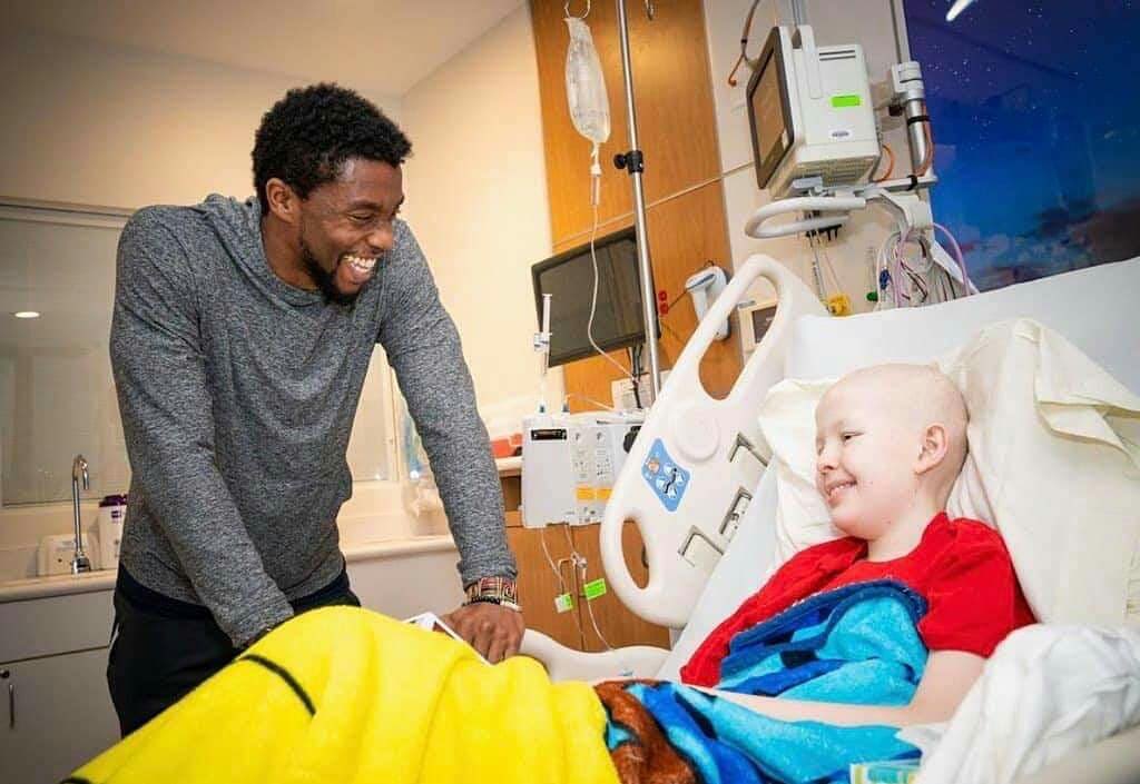 BProudPatriot's tweet photo. #ChadwickBoseman surprising kids at St. Jude Children's Research Hospital while fighting his own battle with cancer. https://t.co/C85y0uMeHc