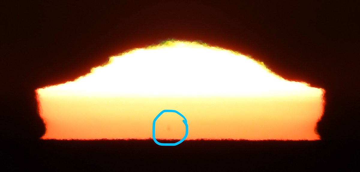 This sunspot appeared as a single dot near the horizon as sunset approached (circled), but then it did something odd... (6/10)