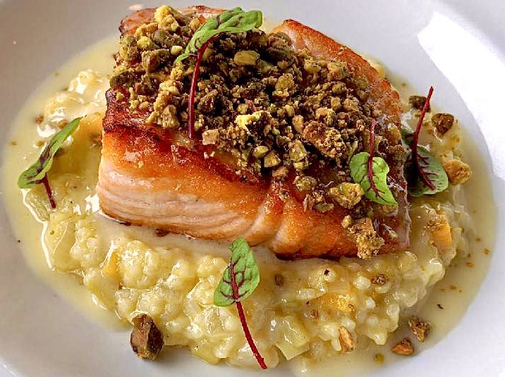 New salmon! Butternut and grilled leek rice grits, classic lemon beurre blanc, and roasted pistachios! #itsonthemenu #getittogo #curbside #postmates #freshsalmon #getthoseomega3s #weekendfood #weekendlife #weekendfoodie #nashvillehotspot #bellemeade #westmeade #ourfamilies
