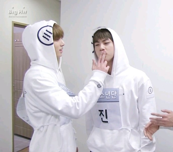 Jungkook bringing his hand against Seokjin's lips for a handkiss; a never ending saga: