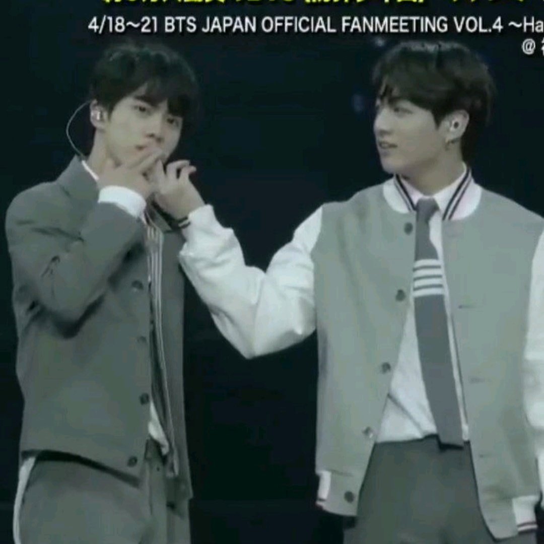 Jungkook bringing his hand against Seokjin's lips for a handkiss; a never ending saga: