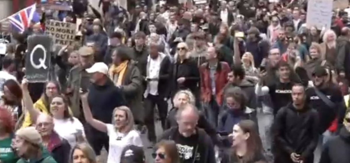 Another Q sign can be seen here, as protesters marched towards Downing Street. This wasn't meant to be a QAnon rally. But some believers still turned up