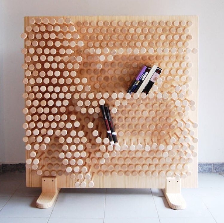 Gharpedia's tweet photo. WoW....! Wooden Pinwall by 'ooomydesign' allows users to constantly change &amp; customise their shelving needs by simply pulling a pin out to form a shelf or pushing a pin in to create space!

#gharpedia  #pinwall #furnitureartist #innovation #furnituredesigner https://t.co/xeSYXsHkE5