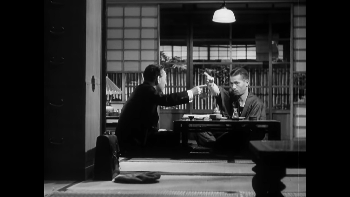 And on cue, Ozu flips the orientation of the scene, showing us the conversation from the opposite angle of the establishing shot we have become accustomed to in the rest of the exchange.