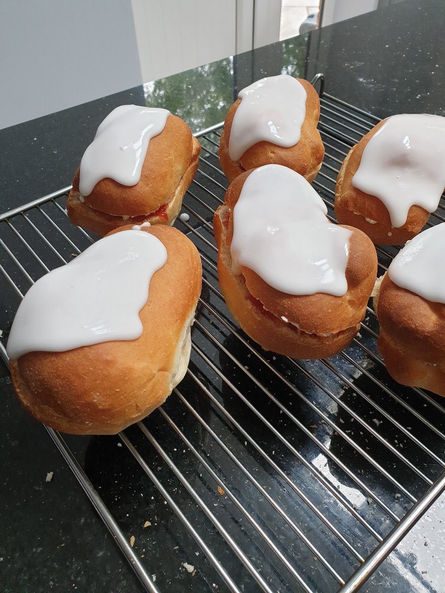 chocolatejoc's tweet photo. Not the neatest buns and no fancy cream piping for the middle but 12 were made and there's only 4 left. I think that says it all! @PaulHollywood love your iced bun recipe! #paulhollywood #homebaking https://t.co/NAbFBmbFjJ