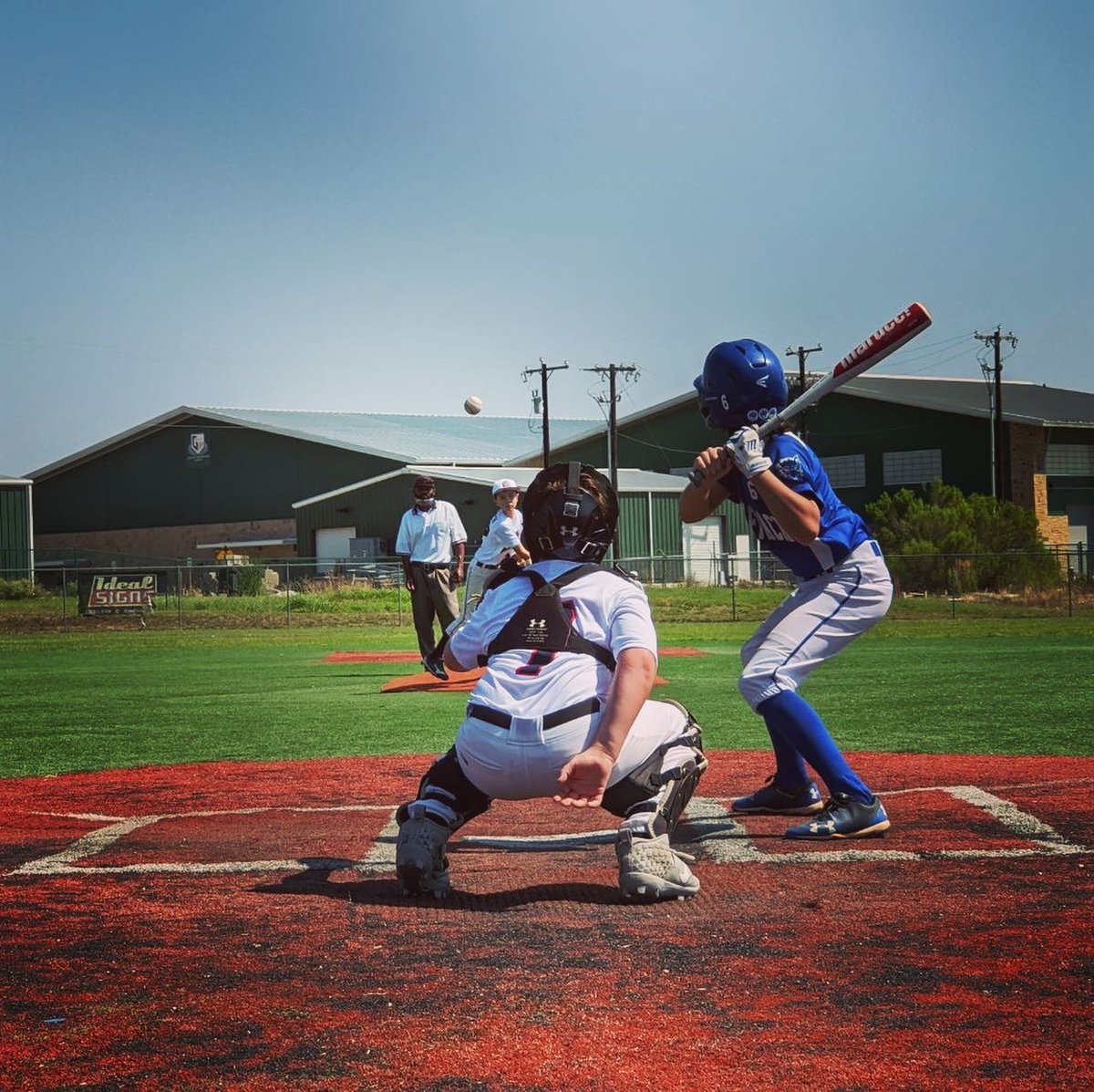 RRWolfPack's tweet photo. The WolfPack posted a 2-0 record in pool play today and will play in the championship game later this afternoon. Pack hitters slugged 28 hits over two games. Here’s Kai (#6) and Matthew (#18) coiled and ready to strike! 💙🐺⚾️ #gopack #wolfpackblue #rrwolfpack https://t.co/zkMseD9mFV