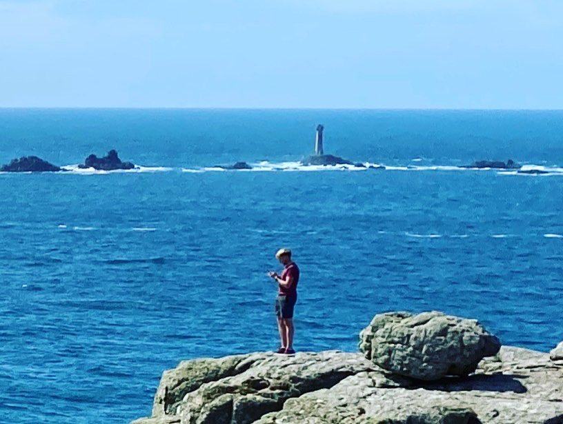 An updated “Wanderer above the Sea” by Caspar David Friedrich from the westernmost point of “continental” Britain.Lands’ End, Cornwall, England. #staycation  #viaggioininghilterra  #uktour  #britishtour  #summer  #britishsummer  #cornwall   #england  #romanticism  #romantic