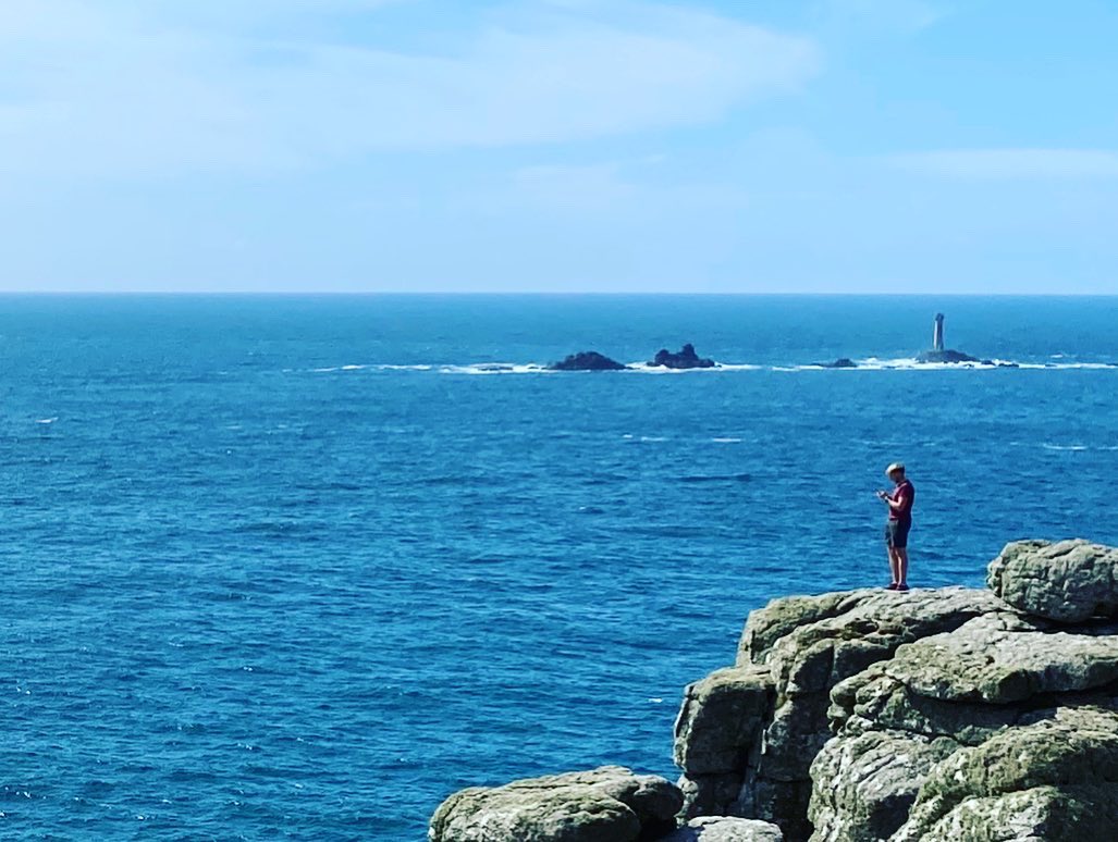 An updated “Wanderer above the Sea” by Caspar David Friedrich from the westernmost point of “continental” Britain.Lands’ End, Cornwall, England. #staycation  #viaggioininghilterra  #uktour  #britishtour  #summer  #britishsummer  #cornwall   #england  #romanticism  #romantic