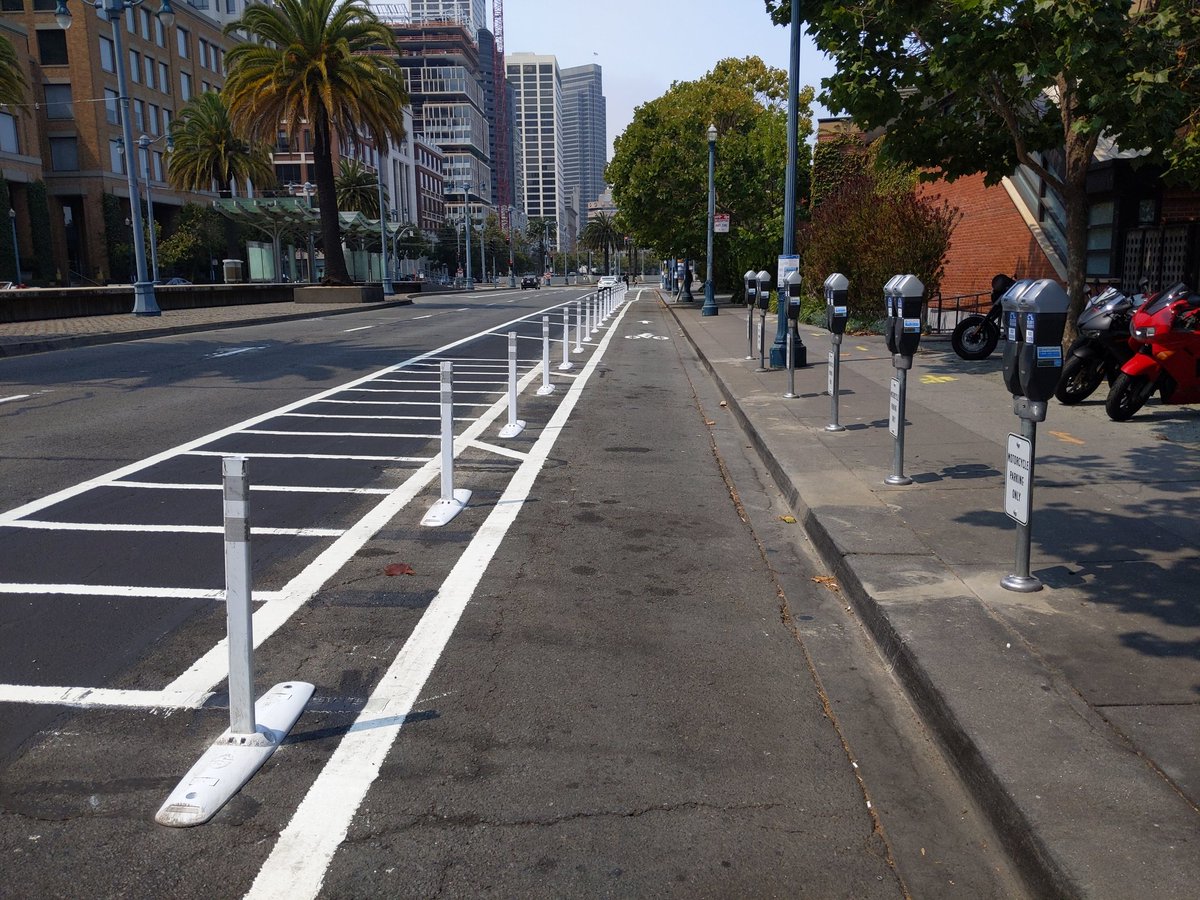 New protection on Embarcadero by Waterbar / Epic, where the valet parking has been a constant problem. Curb to post width is exactly 7', just right.