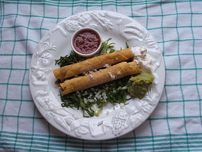 If you take a corn tortilla, stuff it, roll it up and then fry until crispy, then you have a taquito. Delicious with cream, crumbled cheese and dipped in smashed avocados. A long taquito is called a flauta.